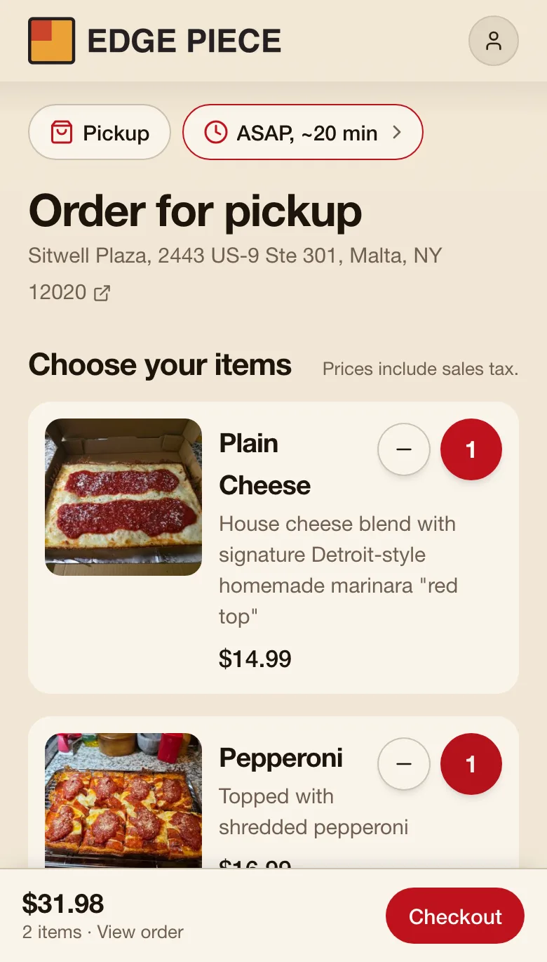 The ordering page on a phone: a pickup time, dishes with photos and prices, two of them added, and a bar along the bottom showing a $31.98 total and a Checkout button.