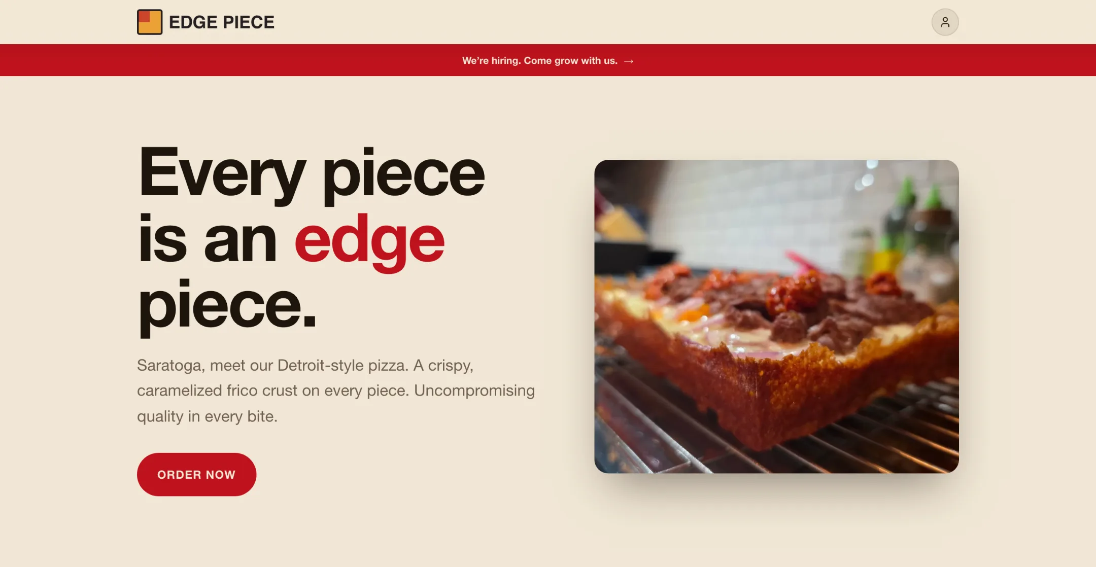 A pizza shop's home page: its own logo and hiring banner, a headline reading “Every piece is an edge piece”, a pizza coming out of the oven and an Order Now button.